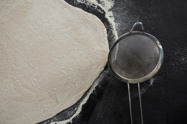 Pizza dough with tea strainer