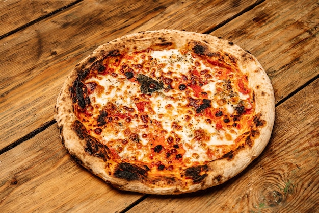 Pizza food background Homemade Neapolitan pizza Margherita with mozzarella cheese and tomato sauce