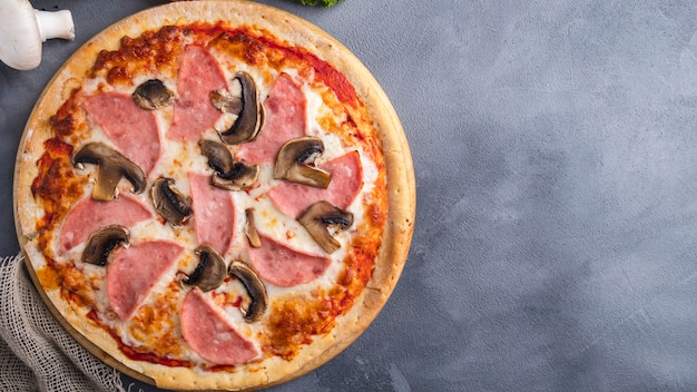 Pizza  ham and mushrooms   . Top view