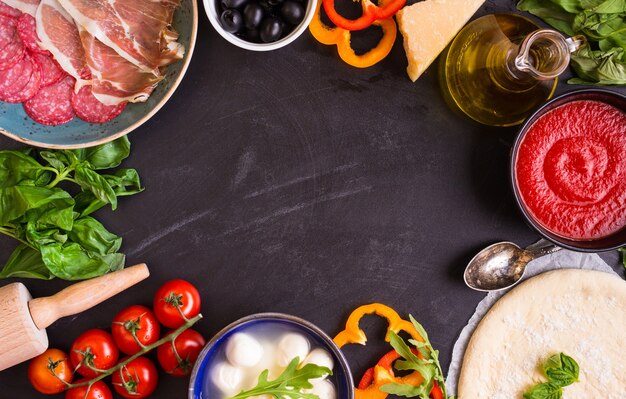 Pizza making background. Ingredients for making pizza.