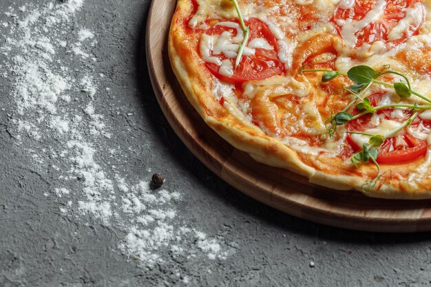 Pizza Margarita with Tomatoes, Basil and Mozzarella Cheese