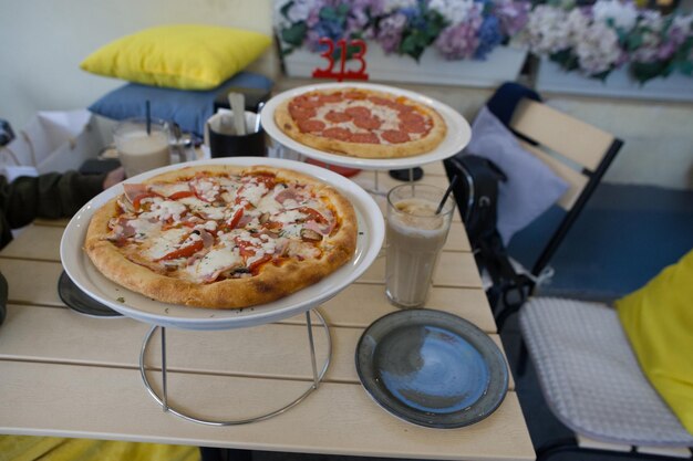 pizza on a plate in a restaurant beautiful pizza serving