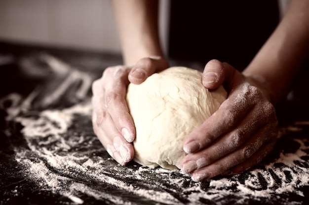 Pizza prepare dough hand topping