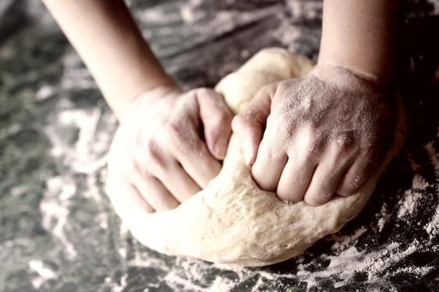 Pizza prepare dough hand topping