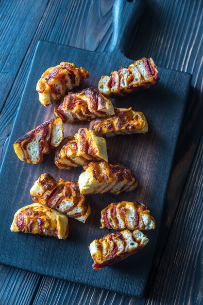 Pizza rolls on the wooden board