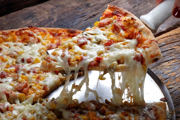 Pizza slice melted cheese