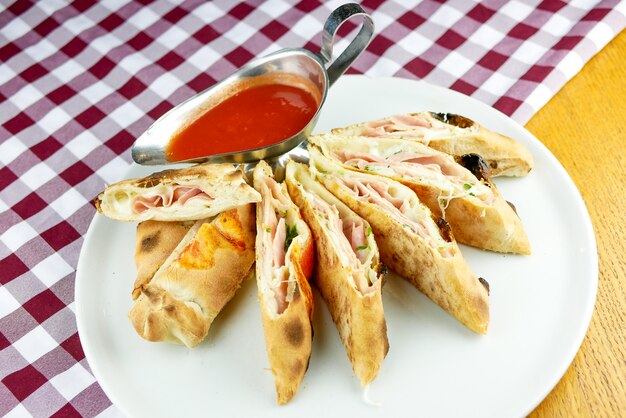 Pizza slices on a restaurant table