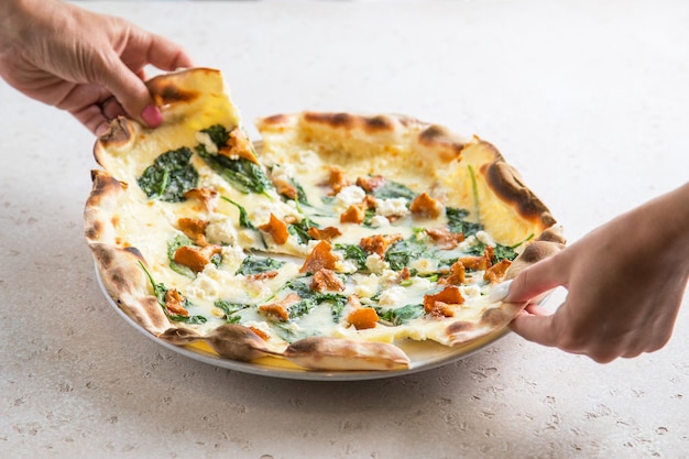 Pizza spinaci and white backgroeund Pizza with Spinach and Chicken