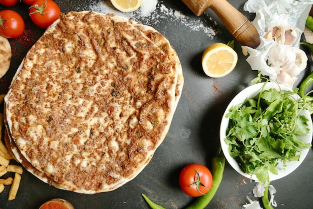 Pizza on Table With Knife