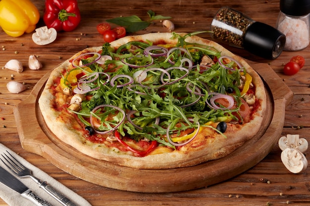 Pizza, variant of classic italian pizza, wooden background