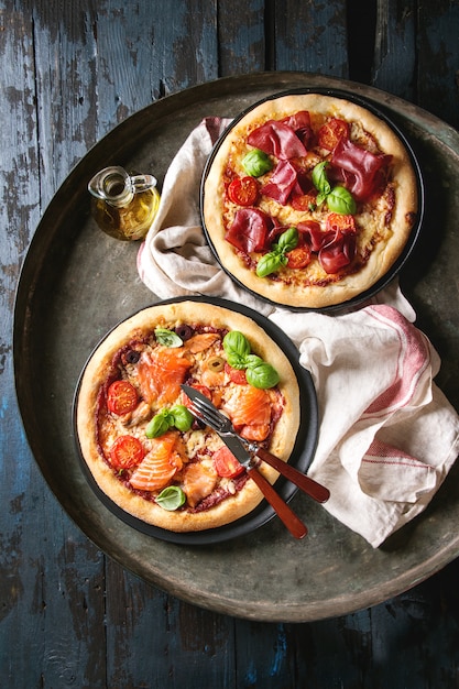 Foto pizza con bresaola e salmone