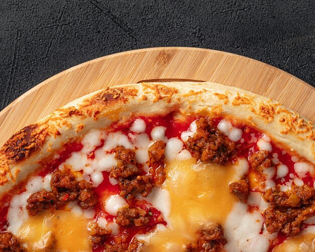 Photo pizza with cheddar cheese and minced beef