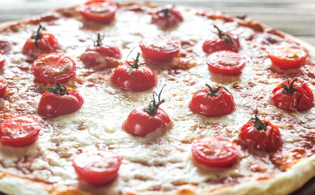 Pizza with cherry tomatoes and mozzarella