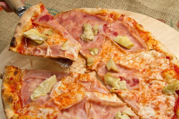 pizza with ham and artichoke