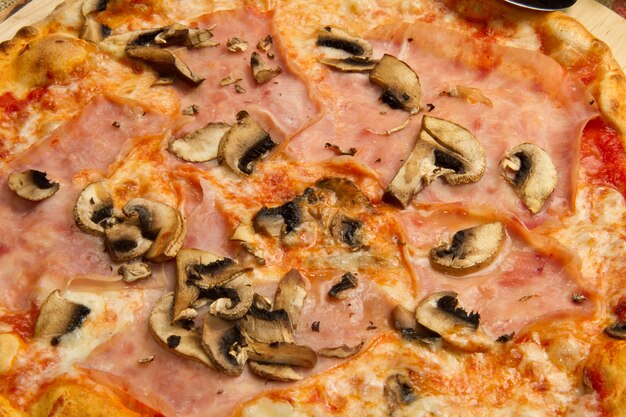 pizza with ham and mushrooms