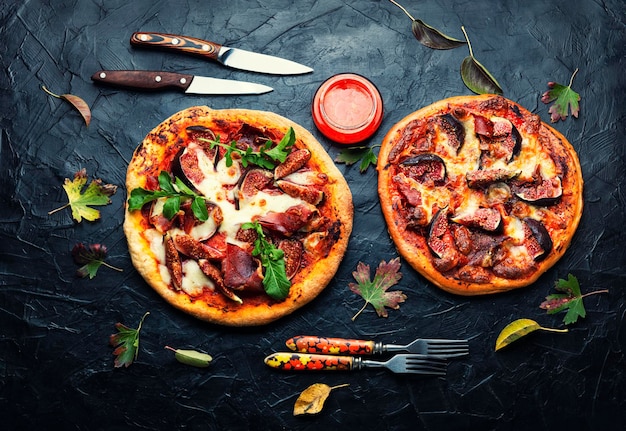 Pizza with jamon and fruits,top view