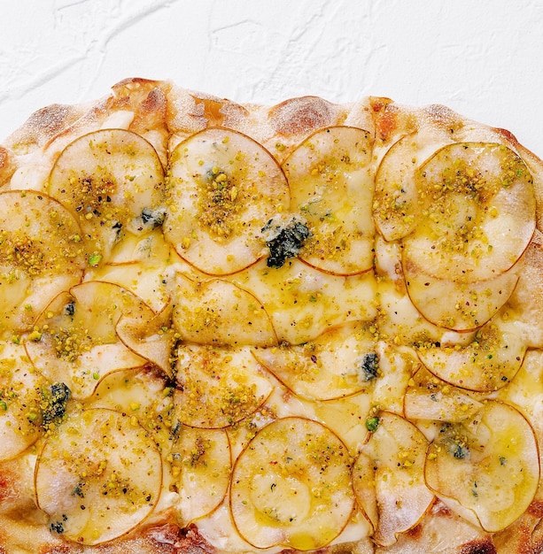 pizza with pear and cheese top view