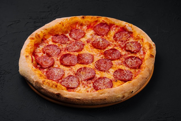 Pizza with pepperoni and parmesan