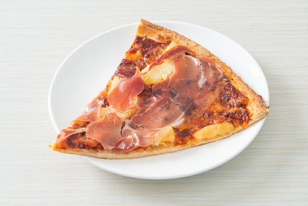 Pizza with prosciutto or parma ham pizza - Italian food style