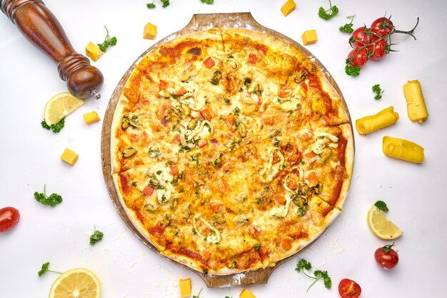 Pizza with seafood and mushrooms