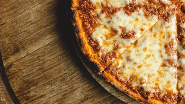 a pizza with a slice taken out of it