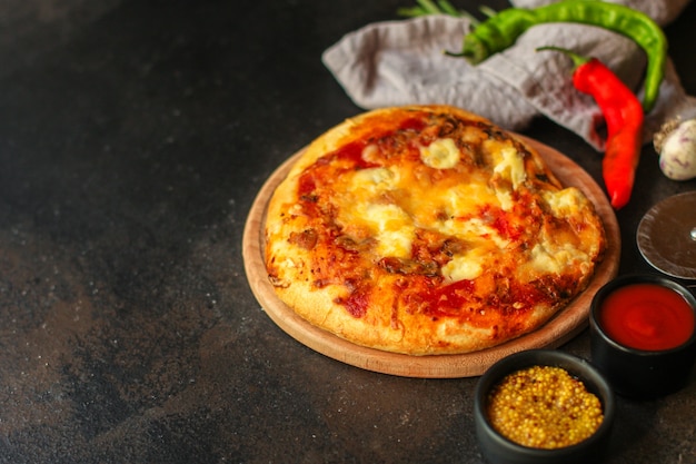 pizza with tomato sauce and cheese