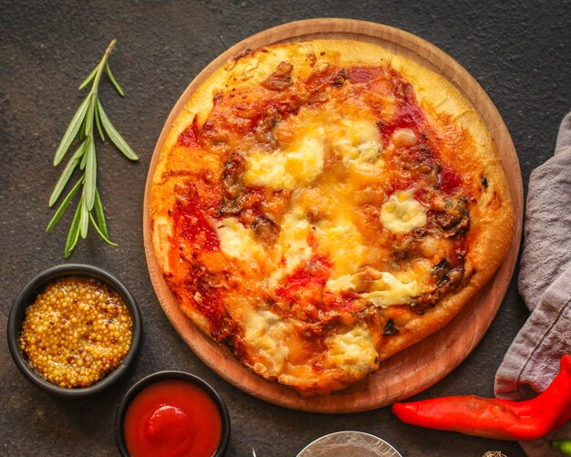 pizza with tomato sauce and cheese