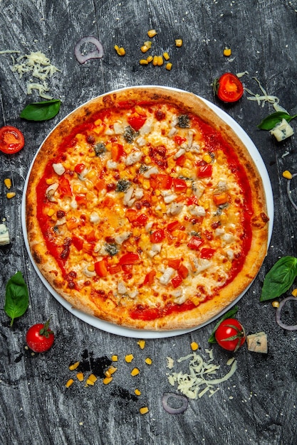 Pizza with tomato sauce mozzarella cabanos mashed and potatoes