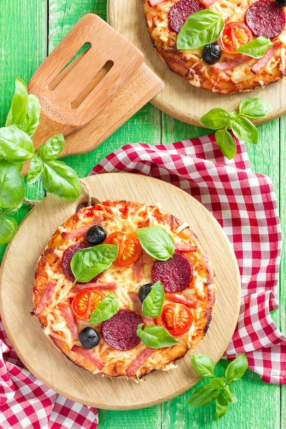 Pizza on a wooden table top view