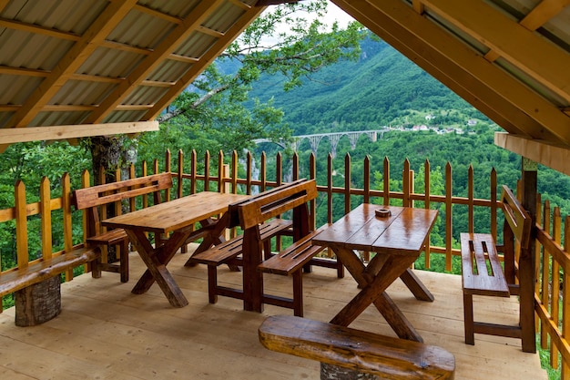 Place of relaxation overlooking the old arched bridge over the Tara River in Montenegro