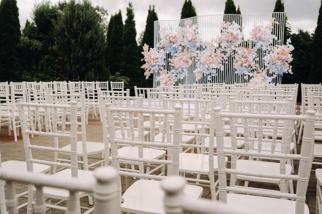 A place for a wedding ceremony on the street. Decorated wedding venue.