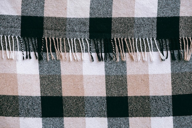 Plaid in een cel als achtergrondafbeelding Blanco geruite stoftextuur