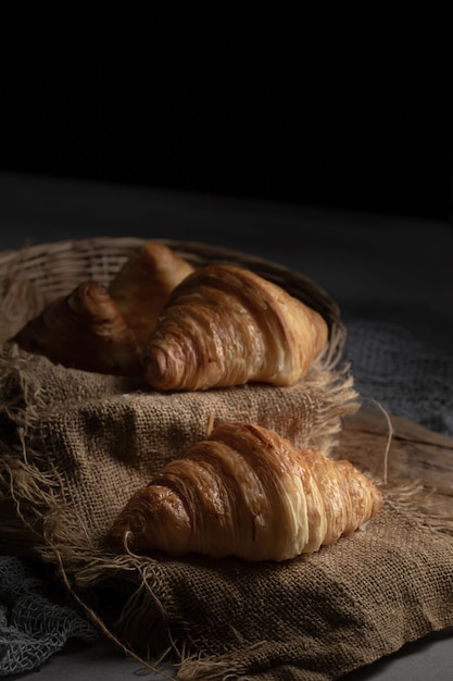 Plain butter croissant crescent pastries, Freshly baked croissants. Warm Fresh Buttery Croissants on a tray.