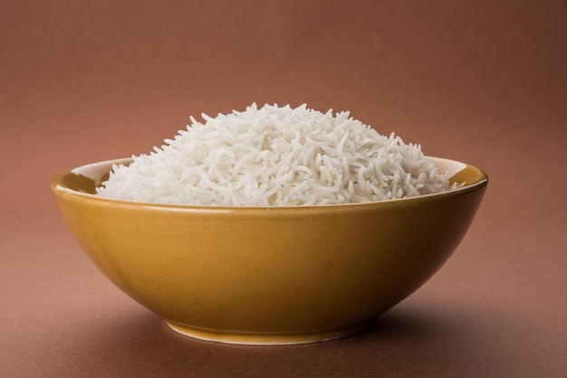 Plain cooked Indian white basmati rice in a ceramic bowl, selective focus