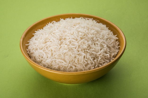 Plain cooked Indian white basmati rice in a ceramic bowl, selective focus