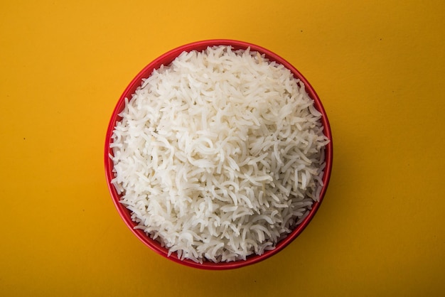 Plain cooked Indian white basmati rice in a ceramic bowl, selective focus