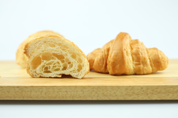 Plain croissant on white background