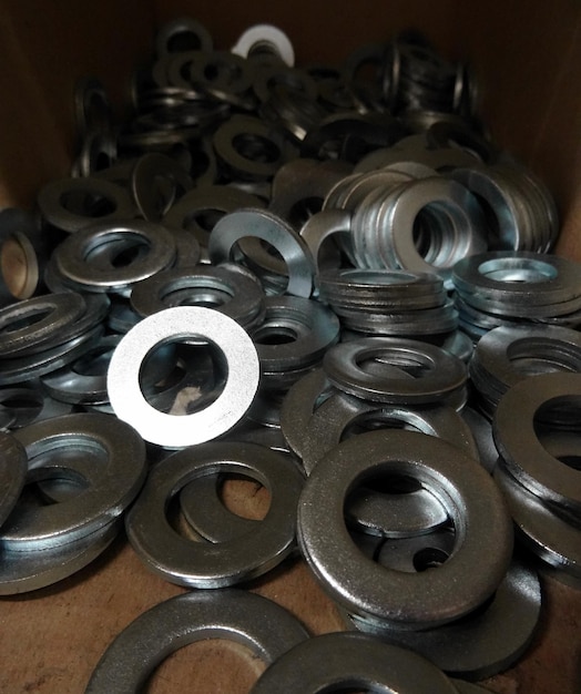 Plain washers in wooden box at the hardware shop