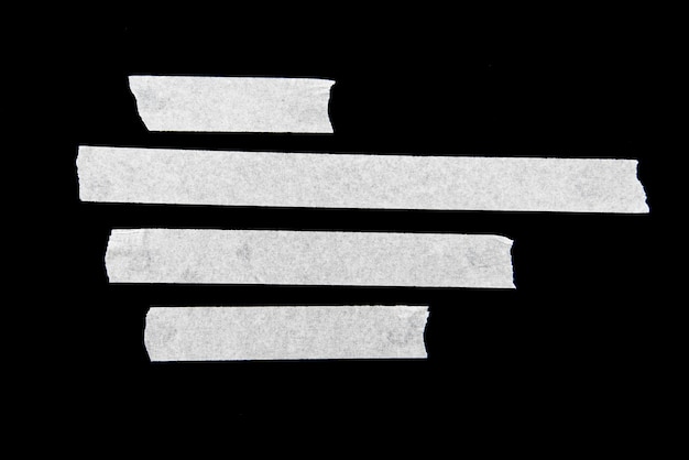 Foto plakband, witte plakband geïsoleerd op zwarte achtergrond