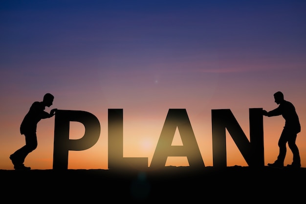 Plan concept with two man on sunset sky background