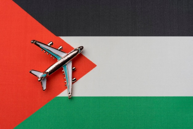 The plane over the flag of Palestine the concept of travel