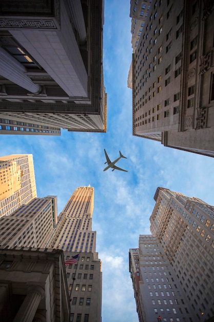 Plane flies over the city over New York