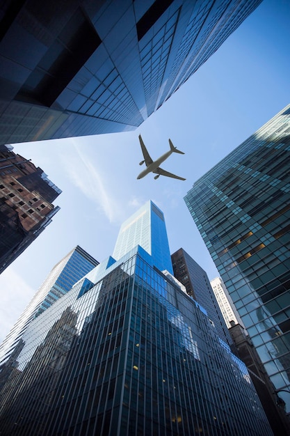 Plane flies over the city over New York