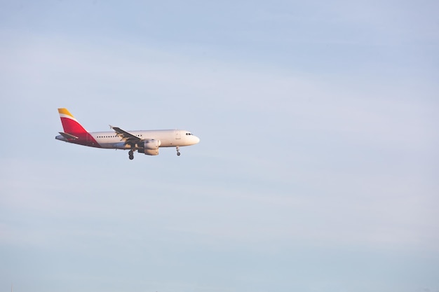 Plane landing at low altitude.