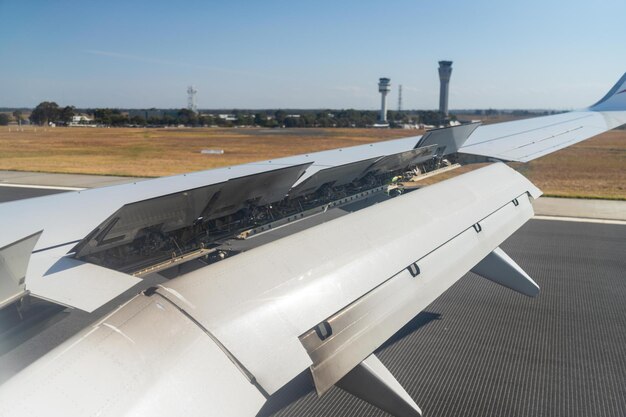 Photo plane landing on a runway in australia