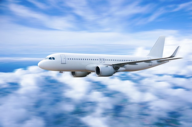 Plane in the sky Passenger commercial plane flying above the clouds concept of fast travel vacation and business