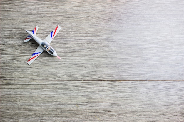 Plane on wooden floor