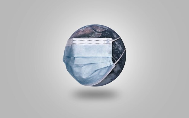 planet earth with medical protective mask, covid-19 pandemic, air pollution concept.