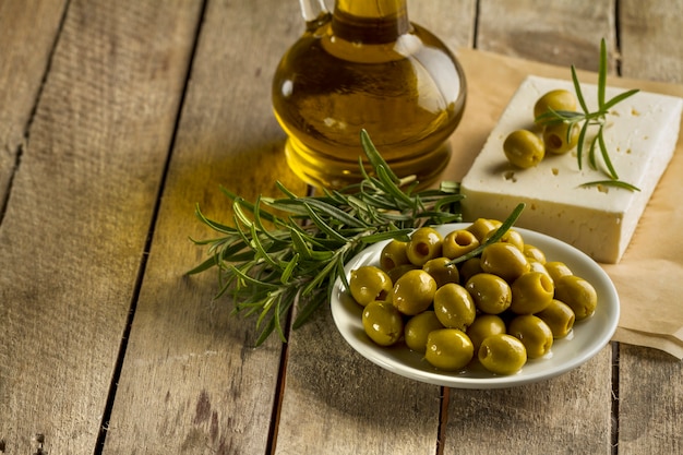 Photo planks with olives and olive oil