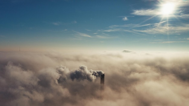 Plant pipe high above the clouds Harmful emissions into the upper atmosphere